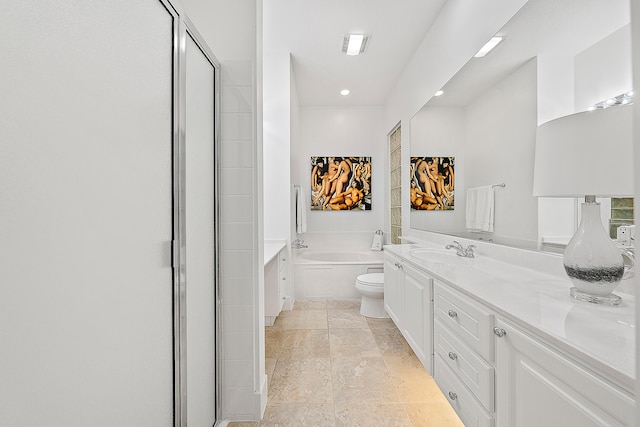 full bathroom with vanity, toilet, and separate shower and tub