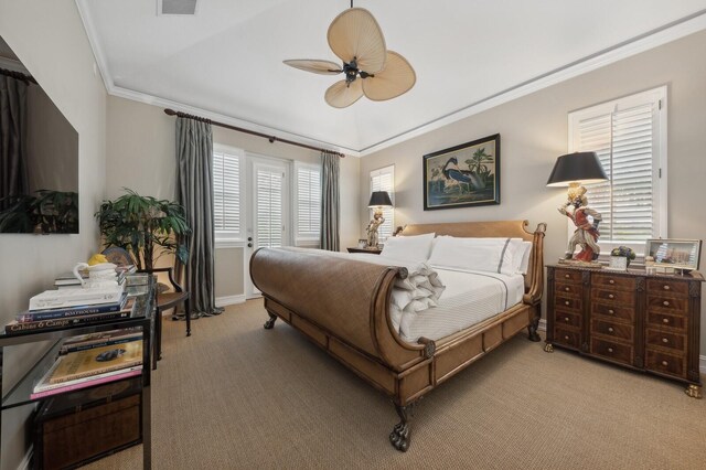 bedroom with ceiling fan, ornamental molding, and light colored carpet