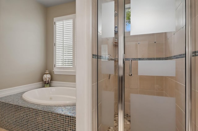 bathroom with independent shower and bath