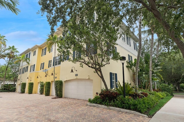 view of building exterior featuring a garage