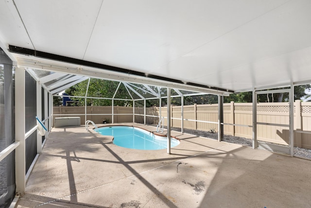 view of swimming pool with a patio, a fenced backyard, a fenced in pool, and a lanai