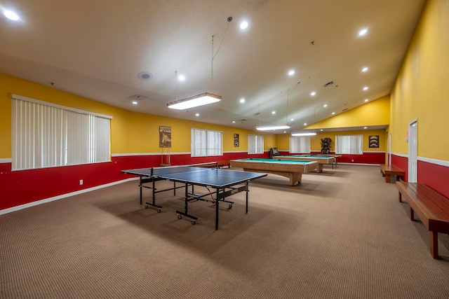 rec room with pool table, carpet floors, and high vaulted ceiling