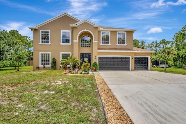 view of front of property featuring a front lawn and a garage