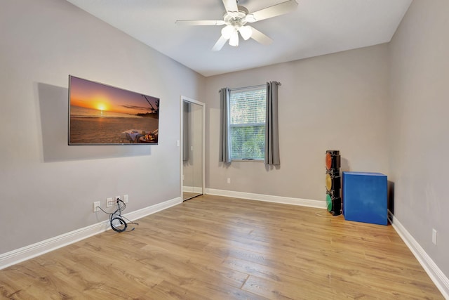 unfurnished room with ceiling fan and light hardwood / wood-style floors