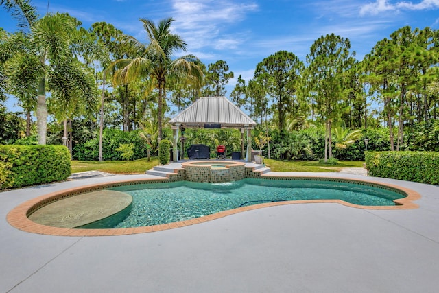 view of pool featuring a gazebo and an in ground hot tub