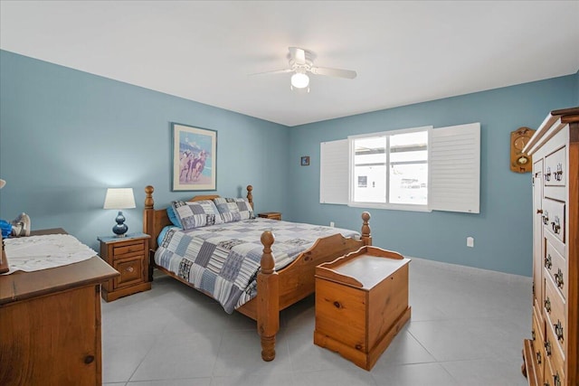 bedroom featuring light tile patterned floors and ceiling fan