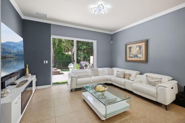 tiled living room with crown molding and a water view