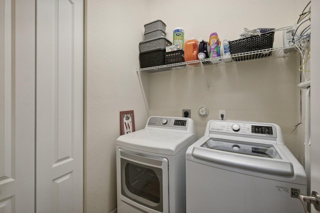 laundry area with washer and dryer