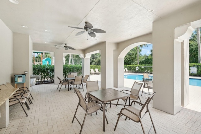 view of patio with ceiling fan