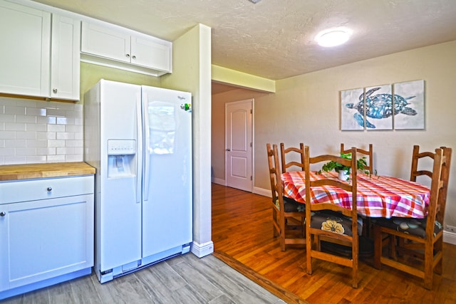 dining room with light hardwood / wood-style flooring