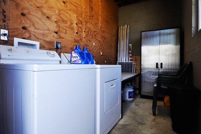 washroom with washer and dryer