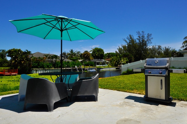 view of patio / terrace with a water view