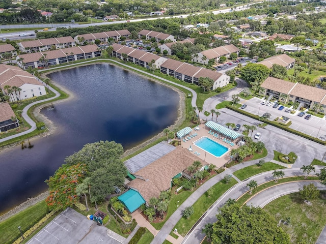 drone / aerial view with a water view