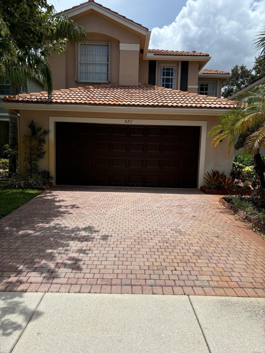 mediterranean / spanish-style house featuring a garage