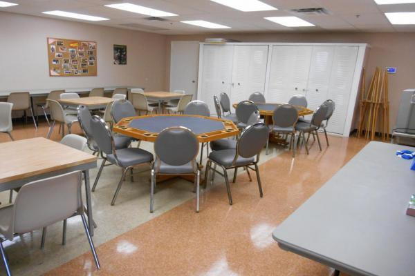 dining area featuring a drop ceiling