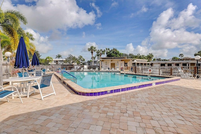 view of swimming pool featuring a patio