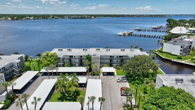 drone / aerial view with a water view