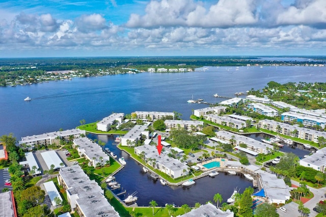 birds eye view of property featuring a water view