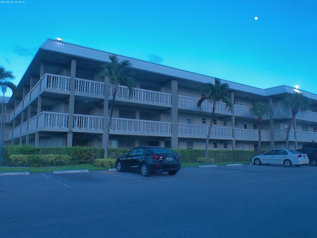 9872 Marina Blvd Unit 1434, Boca Raton, FL 33433 - view of apartment building / complex featuring uncovered parking