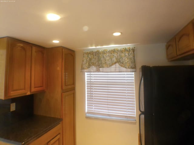 9872 Marina Blvd Unit 1434, Boca Raton, FL 33433 - kitchen featuring freestanding refrigerator, recessed lighting, and dark countertops