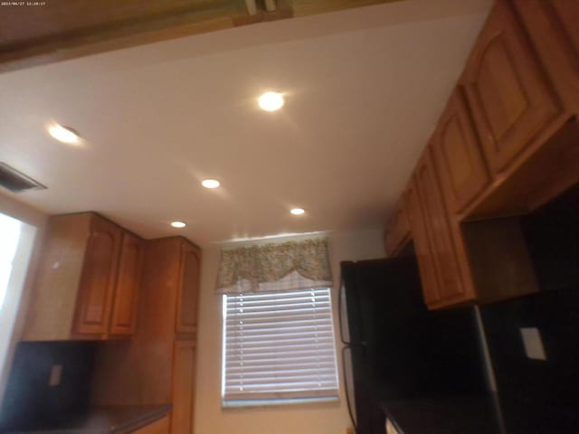 9872 Marina Blvd Unit 1434, Boca Raton, FL 33433 - kitchen featuring recessed lighting and dark countertops