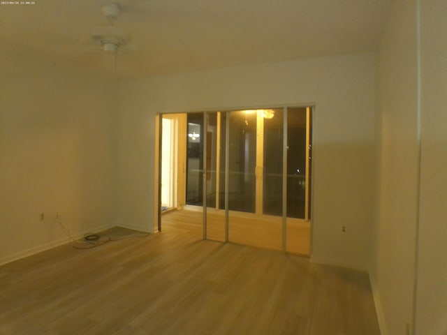9872 Marina Blvd Unit 1434, Boca Raton, FL 33433 - spare room with wood finished floors and baseboards