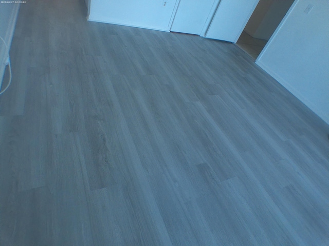 9872 Marina Blvd Unit 1434, Boca Raton, FL 33433 - unfurnished bedroom with wood finished floors