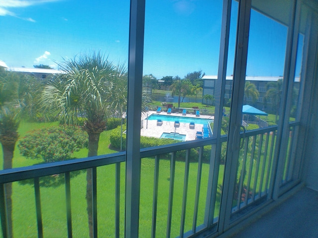 unfurnished sunroom with plenty of natural light