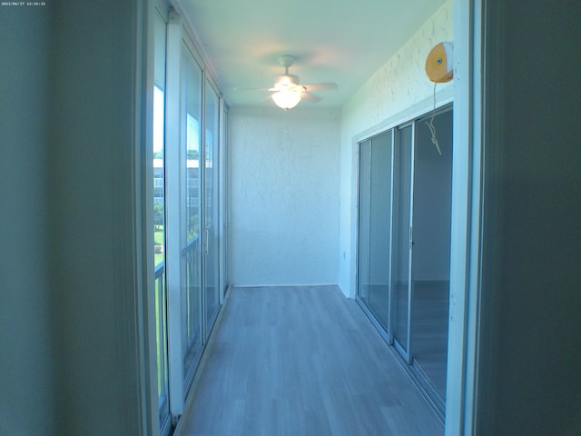 9872 Marina Blvd Unit 1434, Boca Raton, FL 33433 - hall with light wood-style flooring
