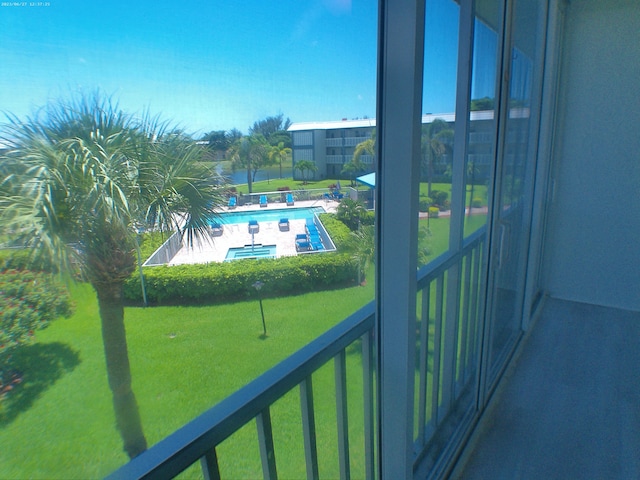 balcony featuring a patio and a community pool