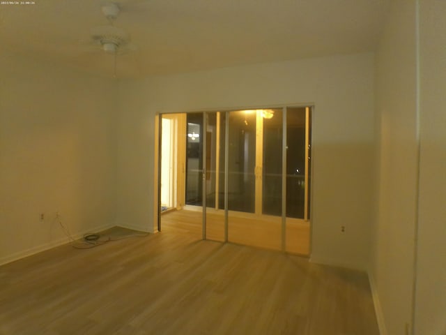 empty room featuring hardwood / wood-style flooring