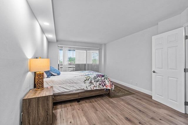 bedroom featuring hardwood / wood-style floors