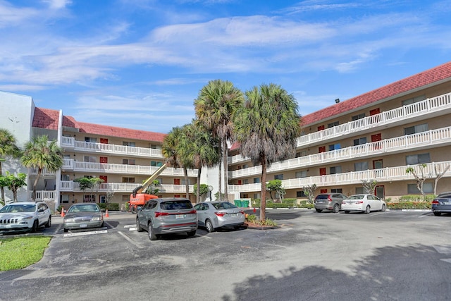 3601 Inverrary Dr Unit 102, Lauderhill, FL 33319 - view of apartment building / complex featuring uncovered parking