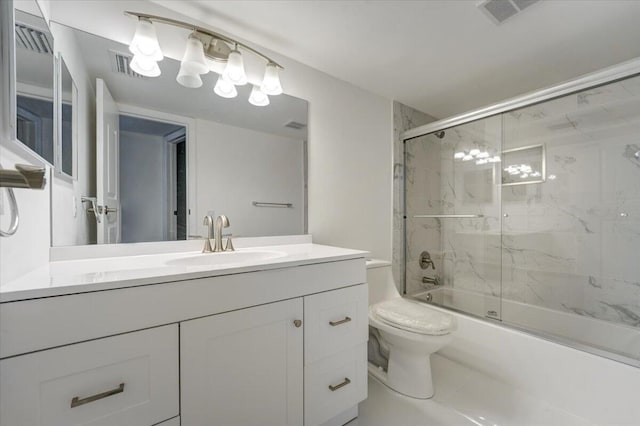 3601 Inverrary Dr Unit 102, Lauderhill, FL 33319 - full bath featuring toilet, bath / shower combo with glass door, and vanity