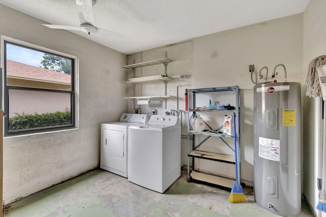 clothes washing area with ceiling fan, washer and clothes dryer, and water heater