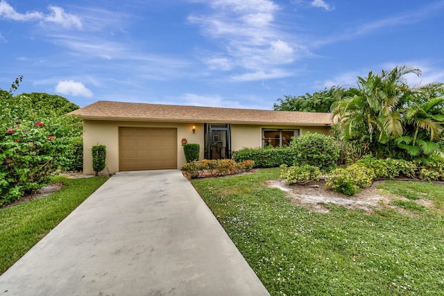 single story home with a front lawn and a garage