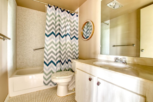 full bathroom featuring tile patterned flooring, vanity, shower / tub combo with curtain, and toilet