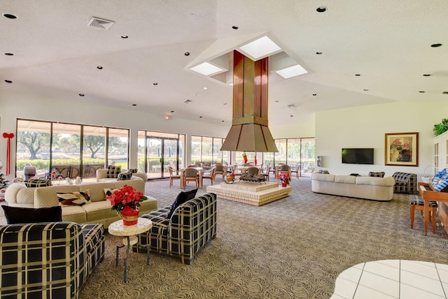 living room featuring tile patterned flooring and high vaulted ceiling