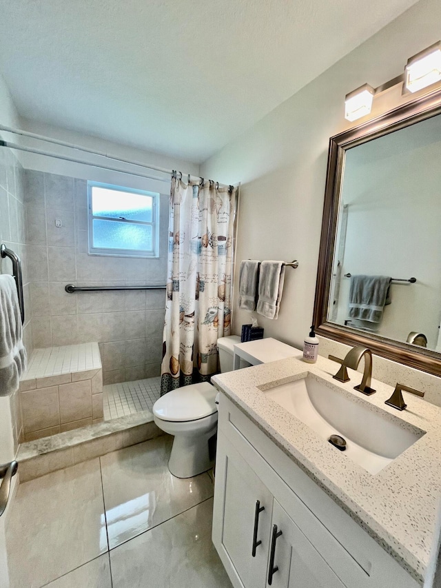 bathroom with walk in shower, tile patterned floors, toilet, and vanity