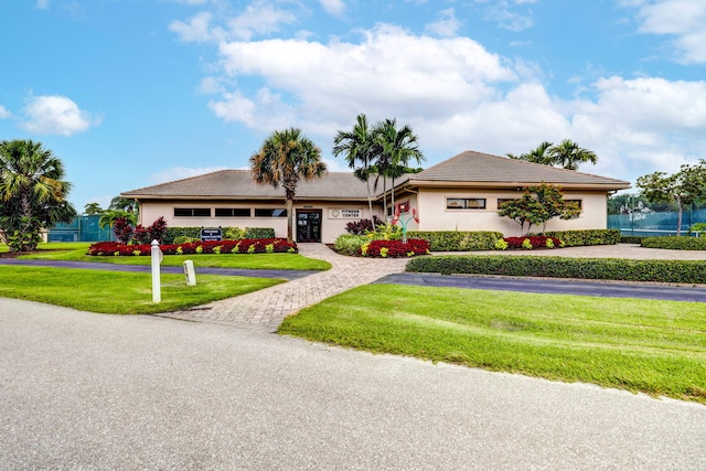 view of front of home with a front yard