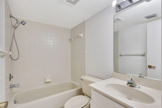 tiled spare room with a textured ceiling and ceiling fan