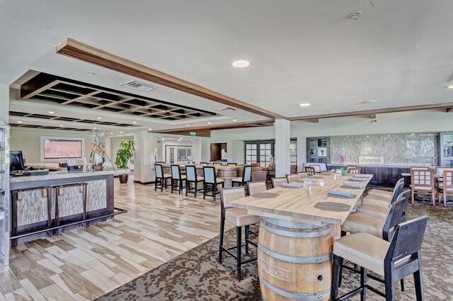 dining space with light hardwood / wood-style flooring