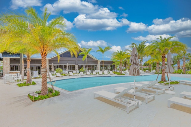 view of swimming pool with a patio