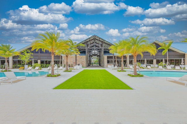 view of swimming pool featuring a patio