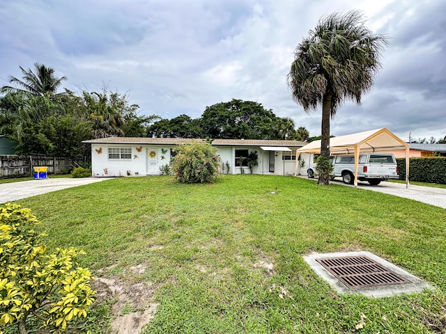 single story home featuring a front yard