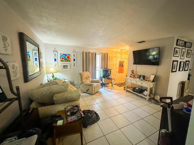 tiled living room with radiator heating unit and a textured ceiling