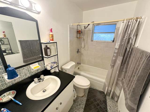 full bathroom featuring vanity, backsplash, toilet, and shower / bath combo with shower curtain