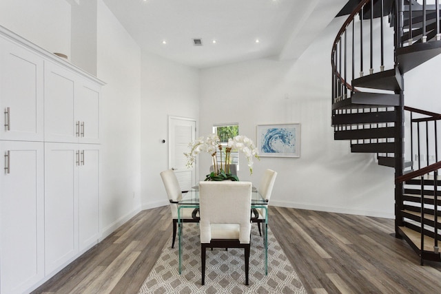 5533 Rico Dr, Boca Raton, FL 33487 - dining room with wood finished floors, stairway, a high ceiling, baseboards, and recessed lighting