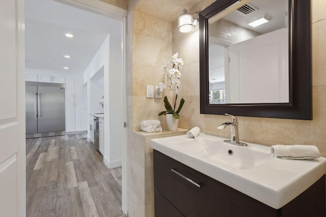 5533 Rico Dr, Boca Raton, FL 33487 - bathroom featuring wood finished floors and vanity