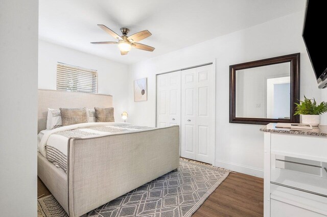 5533 Rico Dr, Boca Raton, FL 33487 - bedroom with wood finished floors, a closet, baseboards, and ceiling fan